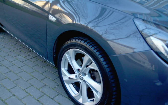 Opel Astra cena 43000 przebieg: 125800, rok produkcji 2016 z Legionowo małe 67